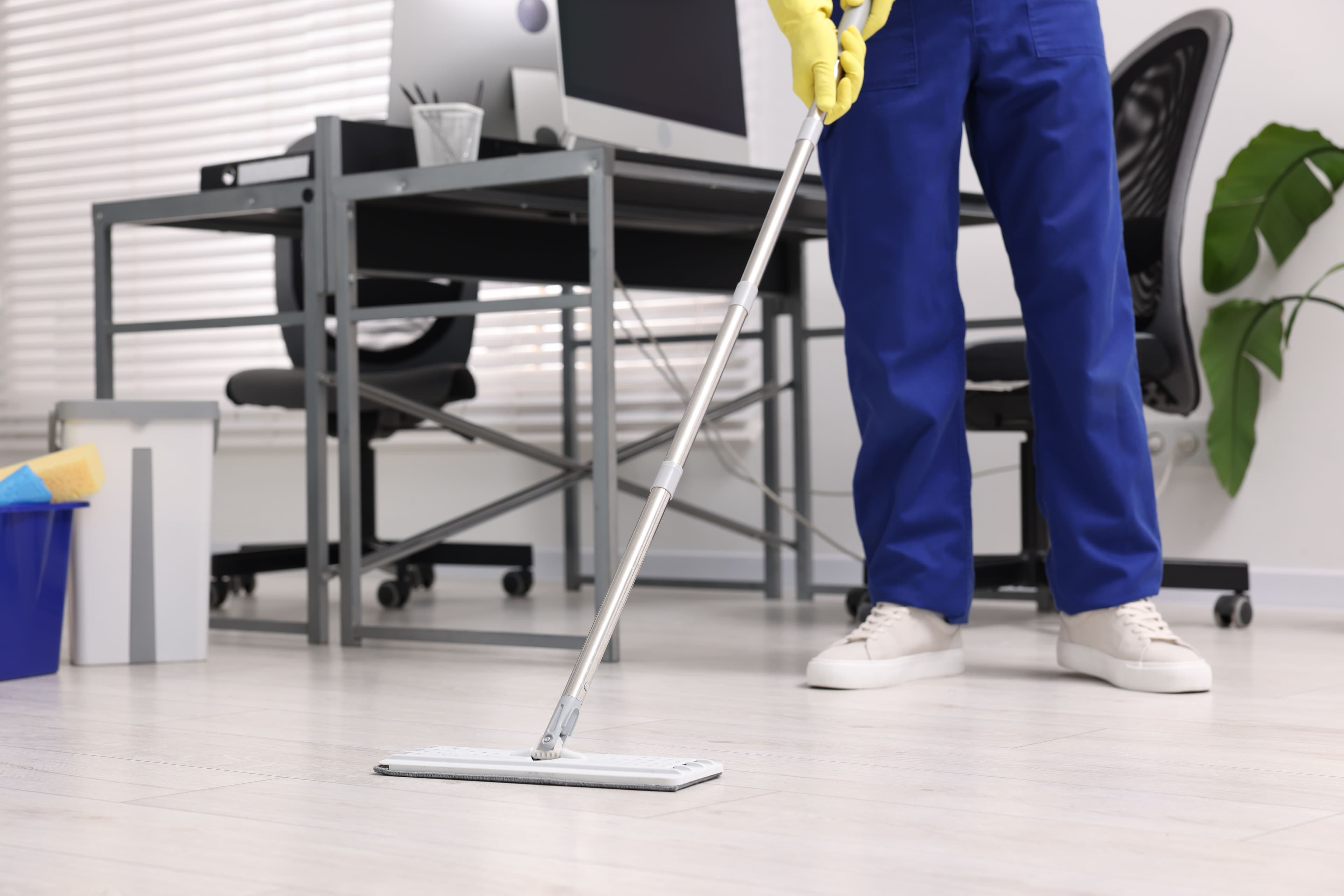 Dundrum Cleaning Services professional cleaner washing office floor